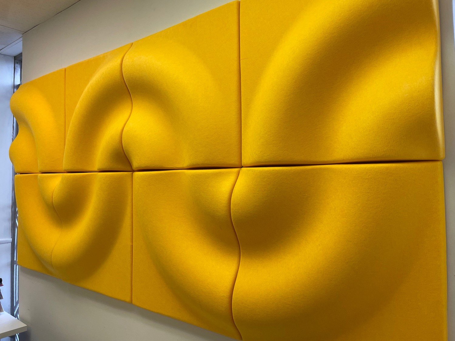 Custom 3D PET acoustic wall panels in multiple colors